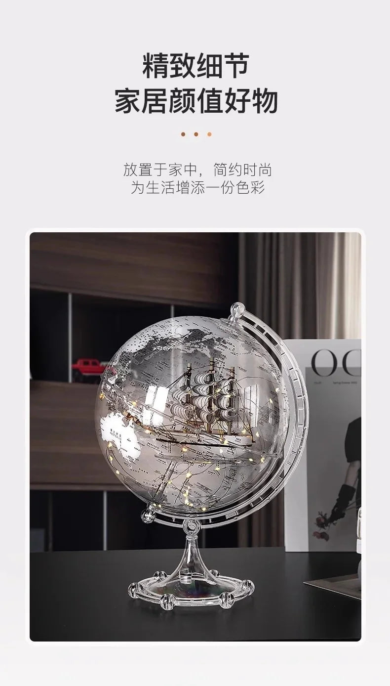 Ornamento moderno di lusso a globo con accenti di barca a vela, elegante scultura in metallo per soggiorno, supporto TV, armadietto del vino, scrivania da ufficio