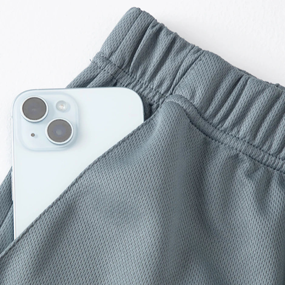 Tuta sportiva estiva da uomo in 2 pezzi ad asciugatura rapida T-shirt a maniche corte ampia e traspirante da corsa e fitness Pantaloncini tascabili neri