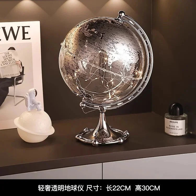 Ornamento moderno di lusso a globo con accenti di barca a vela, elegante scultura in metallo per soggiorno, supporto TV, armadietto del vino, scrivania da ufficio