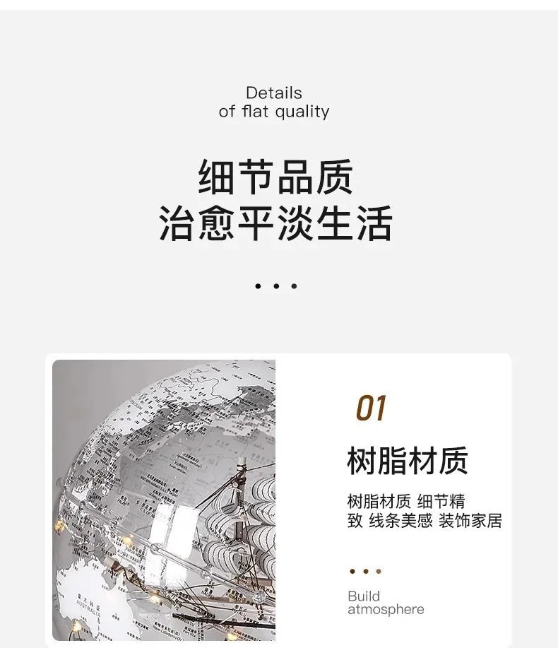 Ornamento moderno di lusso a globo con accenti di barca a vela, elegante scultura in metallo per soggiorno, supporto TV, armadietto del vino, scrivania da ufficio