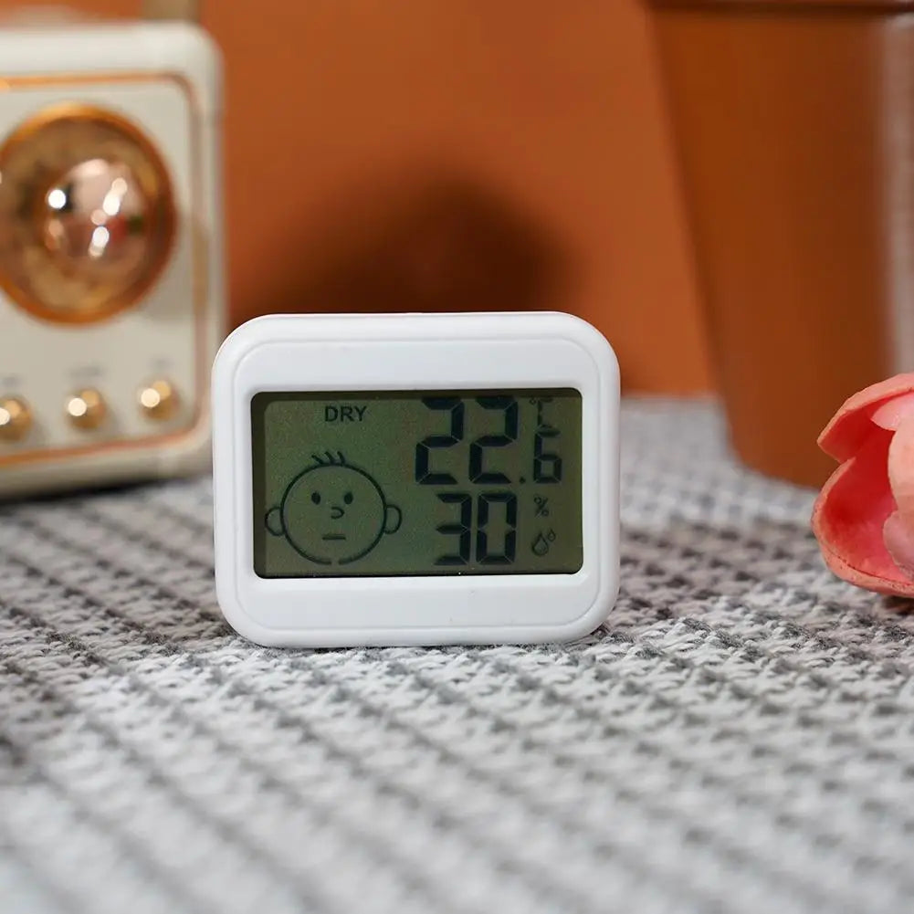 Mini Termometro Digitale LCD Igrometro Orologio Elettronico Misuratore Umidità e Temperatura