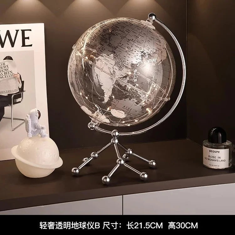 Ornamento moderno di lusso a globo con accenti di barca a vela, elegante scultura in metallo per soggiorno, supporto TV, armadietto del vino, scrivania da ufficio